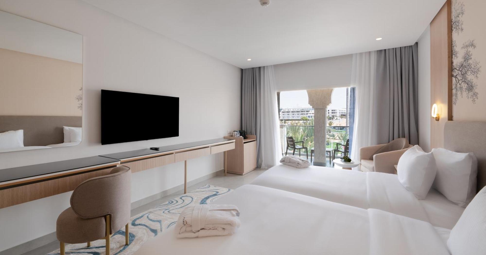 Doppel-/Zweibettzimmer mit seitlichem Meerblick